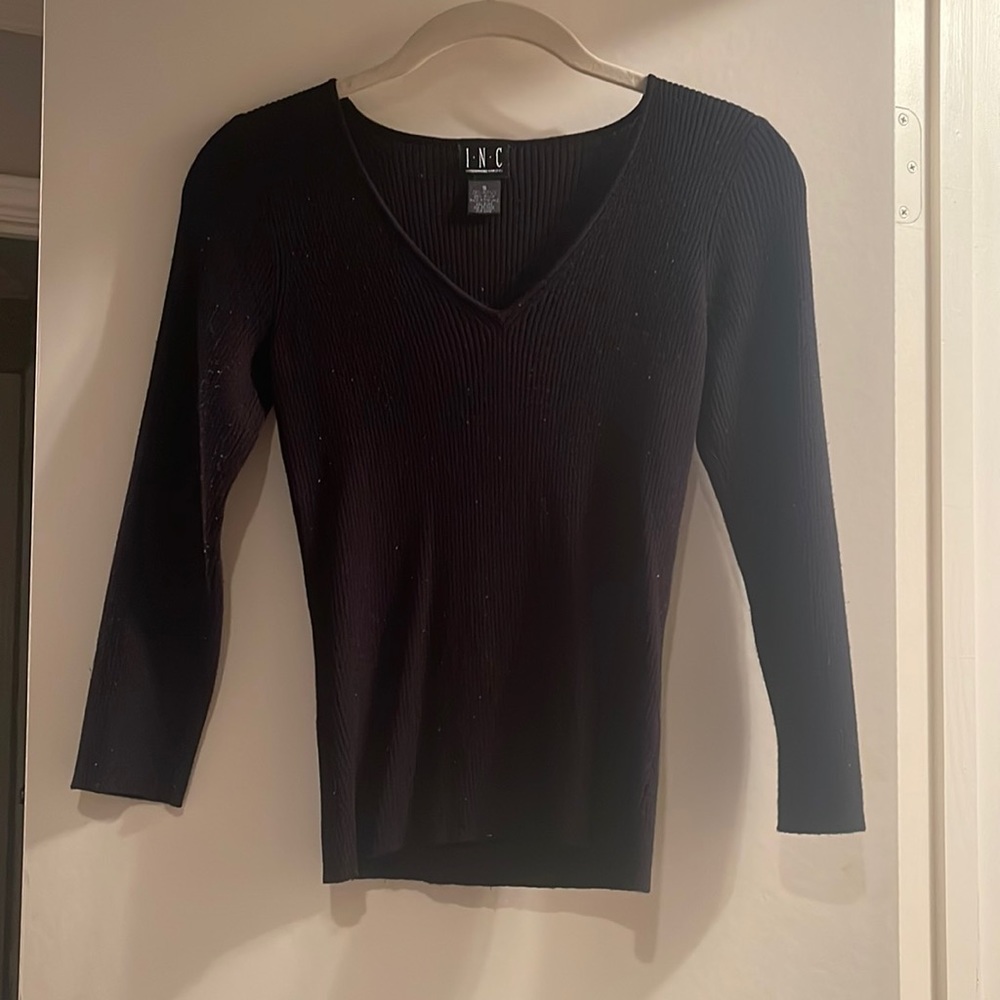 Black ribbed V-neck sweater